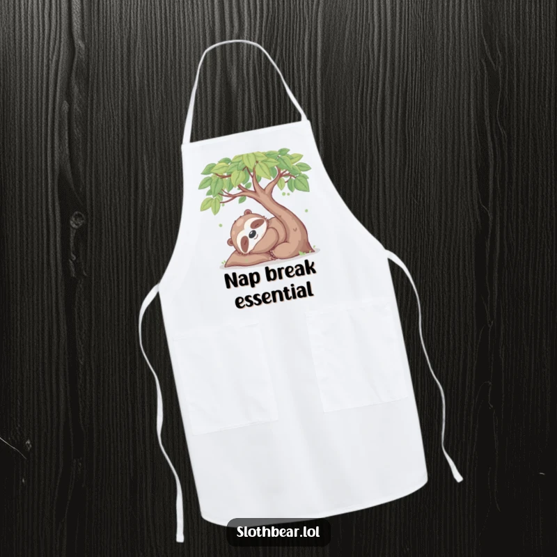 Funny apron showing a happy sloth bear character napping under a leafy tree, perfect for relaxed kitchen sessions.