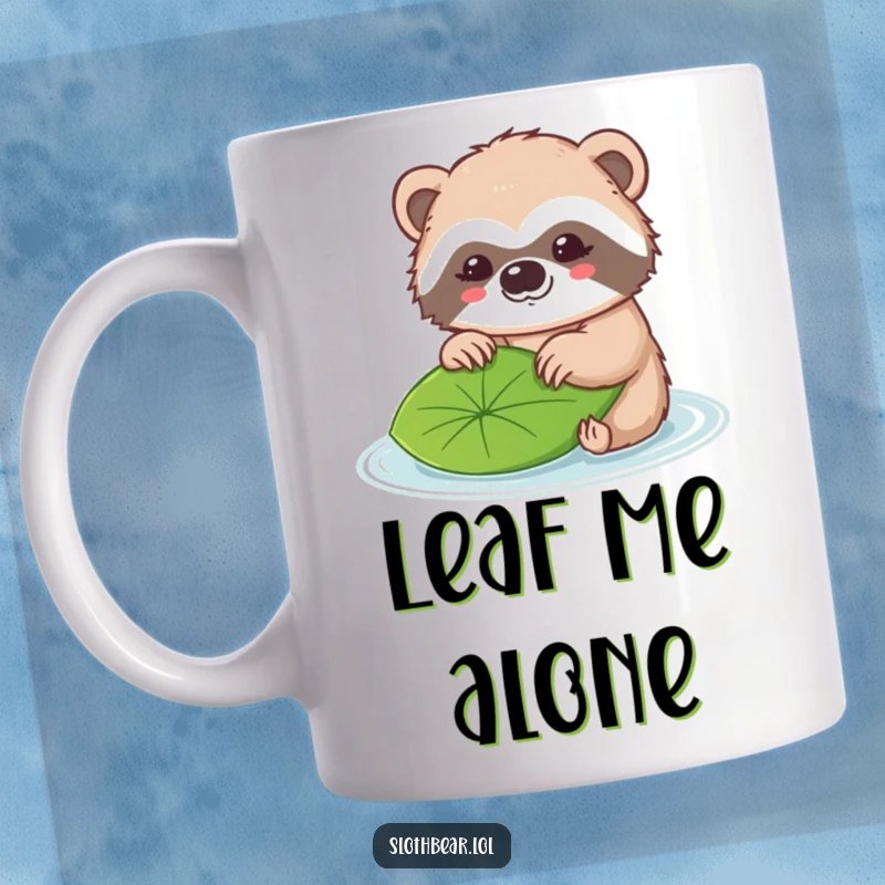 Funny mug with a kawaii sloth bear character gently pushing a single floating leaf with its nose.