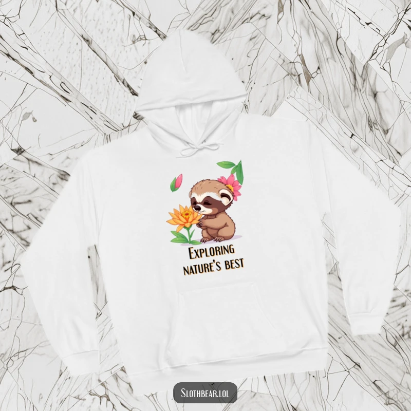 Funny curious sloth bear cub sniffing a vibrant exotic flower, printed on a warm and cozy hoodie.