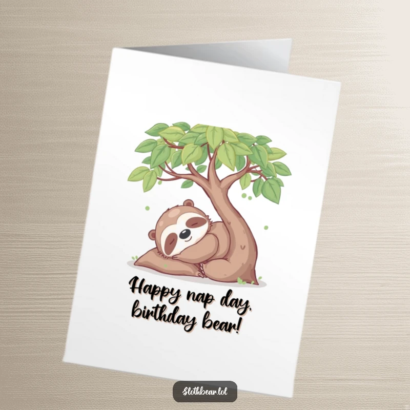 Funny Free Printable Birthday Card: Happy sloth bear peacefully napping under a leafy tree, radiating calm.