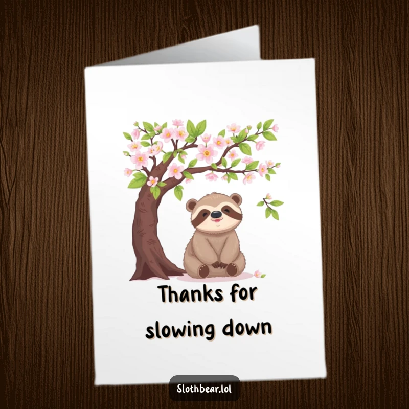Free Printable Thank You Card: A sloth bear sits happily under a blooming tree, expressing peaceful thanks.