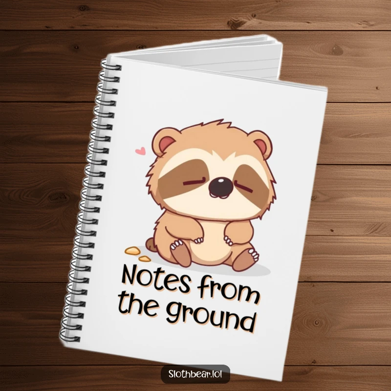 Funny notebook with a dazed sloth bear looking confused after a gentle fall, perfect for notes and sketches.