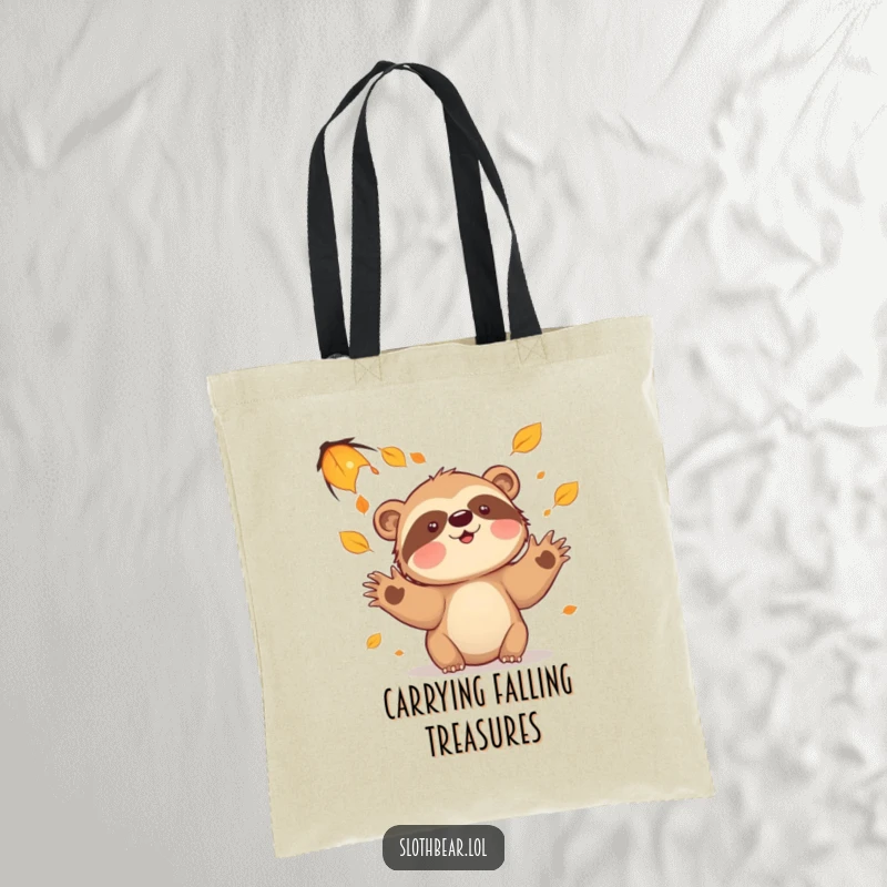 Funny sloth bear leaves tote bag, ideal for carrying autumn finds, featuring a character playfully catching falling leaves.